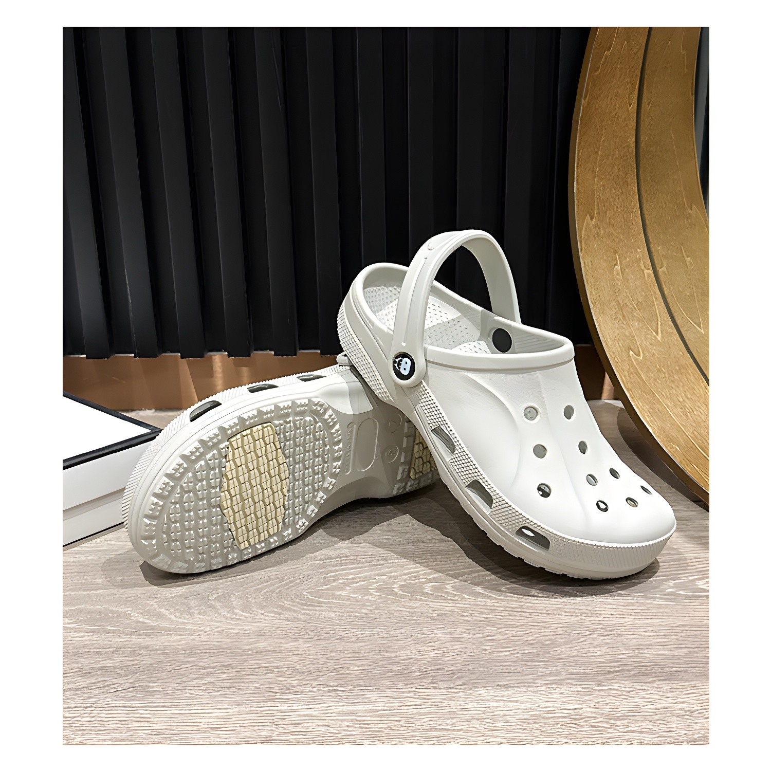 White clog showing side profile and sole detail