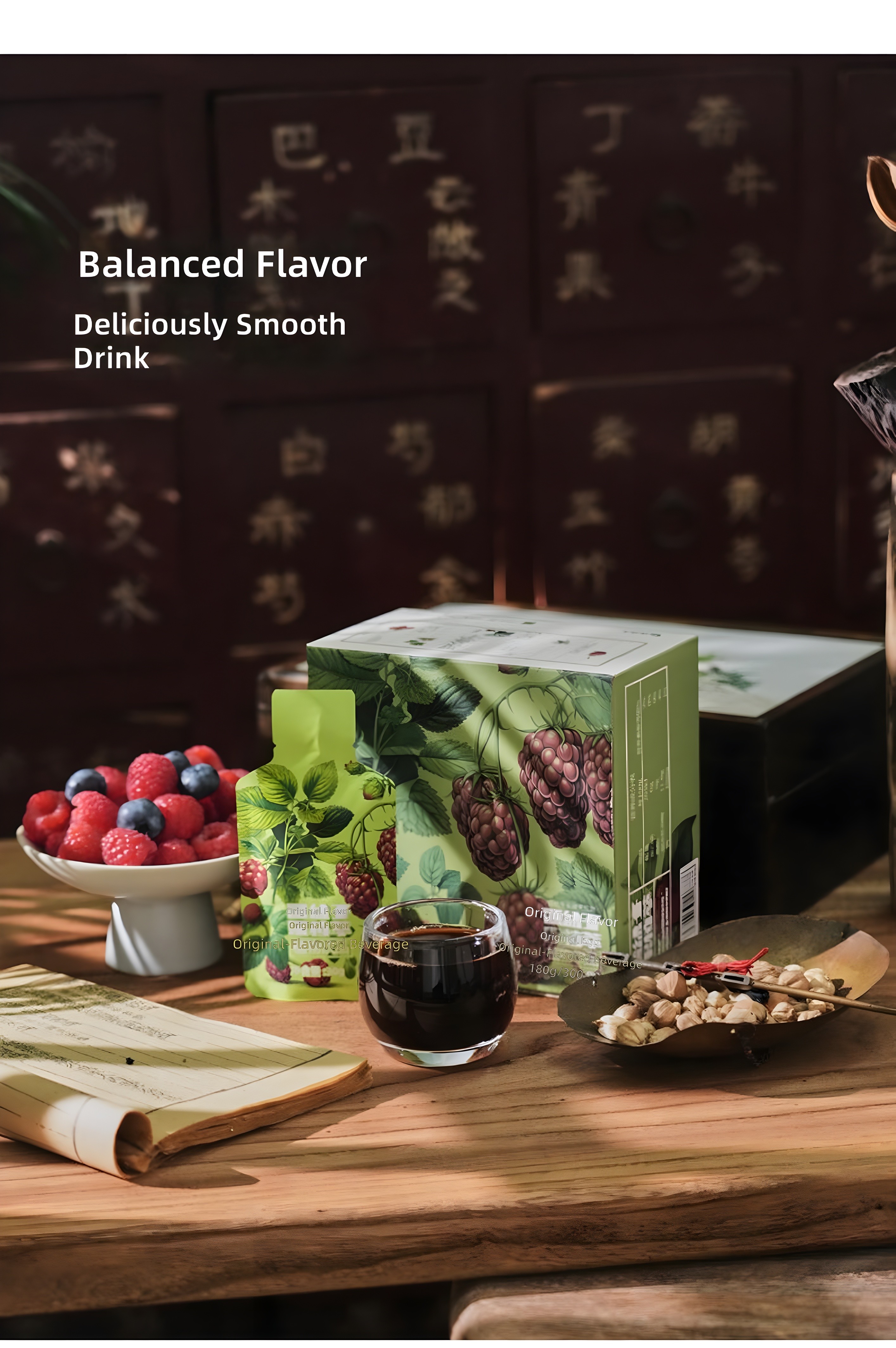 Black-and-white promotional image with text overlay: 'Balanced Flavor, Deliciously Smooth Drink', showing the same product arrangement in monochrome aesthetic
